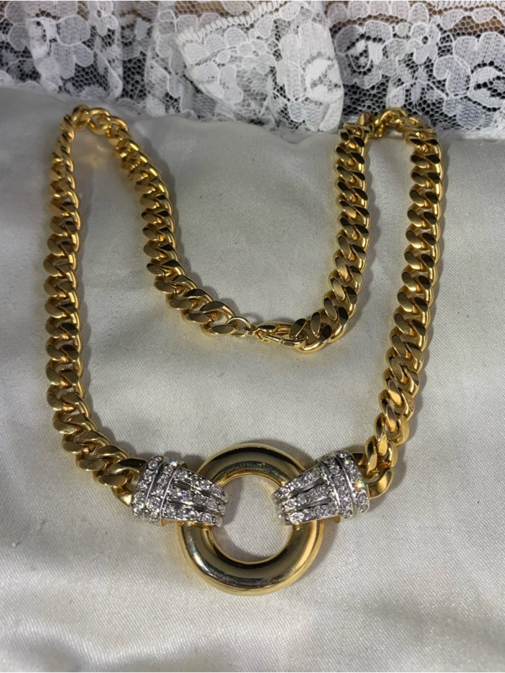 Park Lane Gold-Tone Chunky Curb Link Choker accented with Rhinestones.